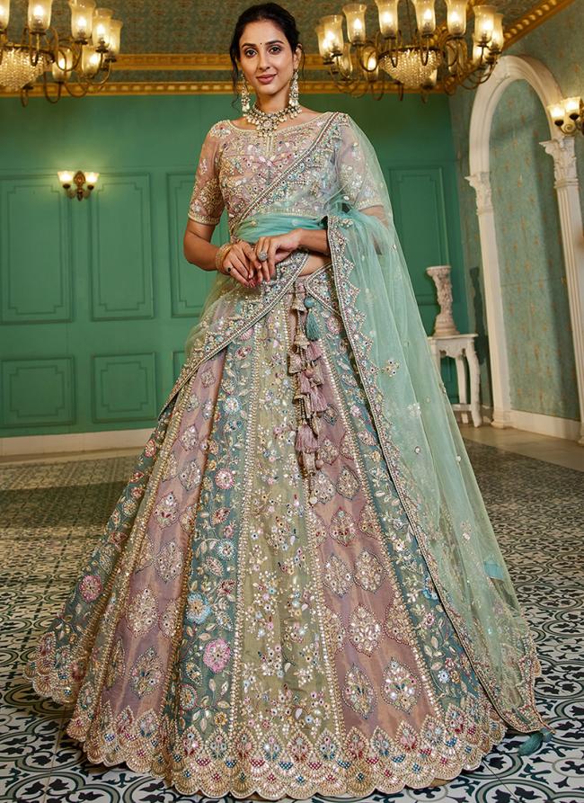 Net Turquoise Blue Bridal Wear Stone Work Lehenga Choli